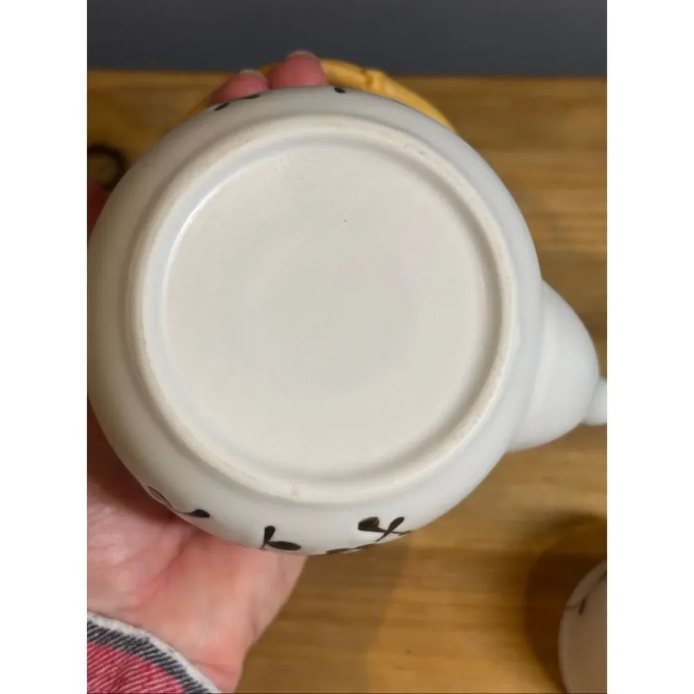 White ceramic tea pot and 4 tea cups with black cherry blossoms